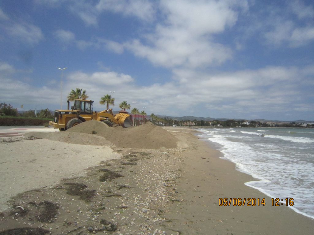 APORTACIÓN Y REPERFILADO EN CALA AVELLANERS (L'AMPOLLA) (Durante las obras)